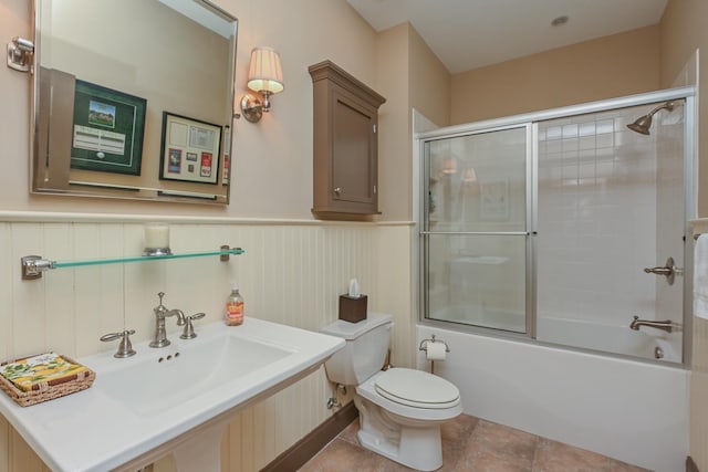 835 Jackson Grove Rd, Columbus, NC 28722 - full bath featuring bath / shower combo with glass door, wainscoting, and vanity