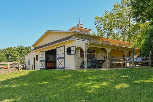 835 Jackson Grove Rd, Columbus, NC 28722 - back of property with an exterior structure, a chimney, and an outbuilding