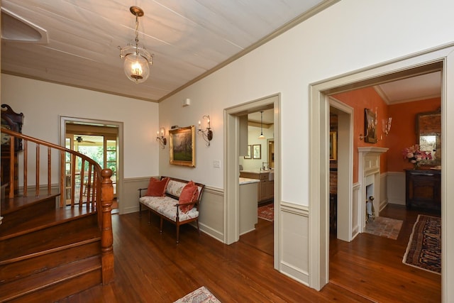 835 Jackson Grove Rd, Columbus, NC 28722 - corridor featuring ornamental molding, dark wood-type flooring, wainscoting, and stairway