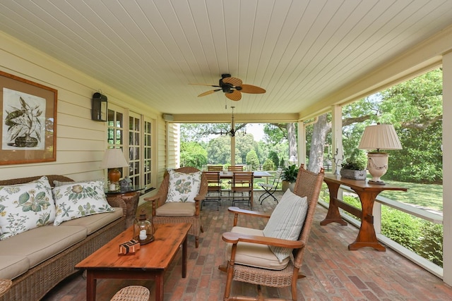 835 Jackson Grove Rd, Columbus, NC 28722 - sunroom / solarium featuring outdoor lounge area, healthy amount of natural light, wood ceiling, a ceiling fan, and wood walls