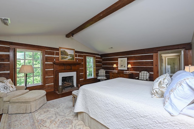 835 Jackson Grove Rd, Columbus, NC 28722 - bedroom with wood finished floors, wooden walls, and a fireplace with flush hearth