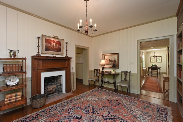 835 Jackson Grove Rd, Columbus, NC 28722 - living area featuring a chandelier, a fireplace with flush hearth, wood finished floors, and ornamental molding