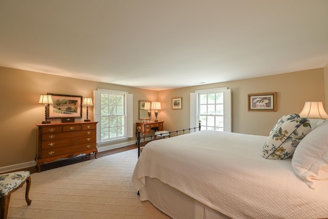 835 Jackson Grove Rd, Columbus, NC 28722 - bedroom with multiple windows and light wood-style floors