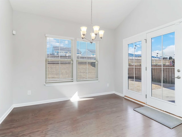 510 Bucklebury Rd, Greer, SC 29651 - empty room with plenty of natural light, a chandelier, wood finished floors, and vaulted ceiling