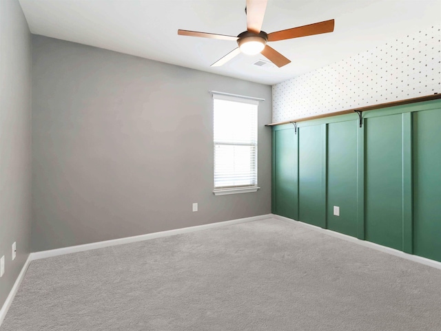510 Bucklebury Rd, Greer, SC 29651 - unfurnished bedroom featuring carpet floors, ceiling fan, and wallpapered walls