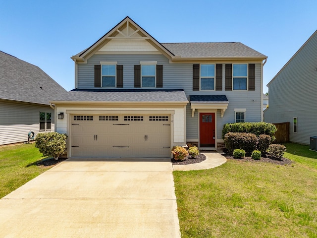 510 Bucklebury Rd, Greer, SC 29651 - view of front of home with a front yard, driveway, an attached garage, and a shingled roof