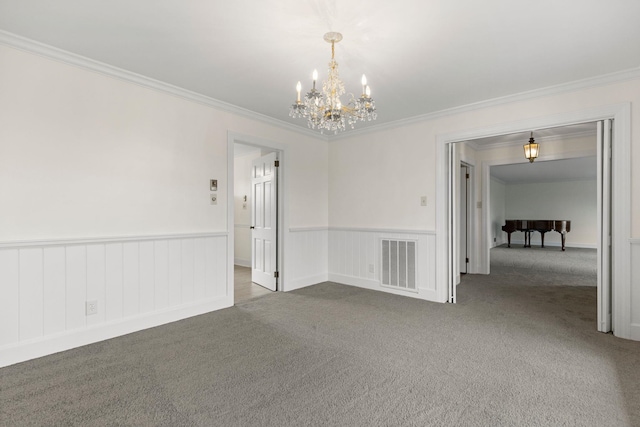 802 Hickory Hollow Rd, Inman, SC 29349 - empty room with carpet flooring, a chandelier, ornamental molding, and wainscoting