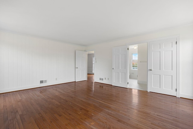 802 Hickory Hollow Rd, Inman, SC 29349 - empty room featuring wood-type flooring and crown molding