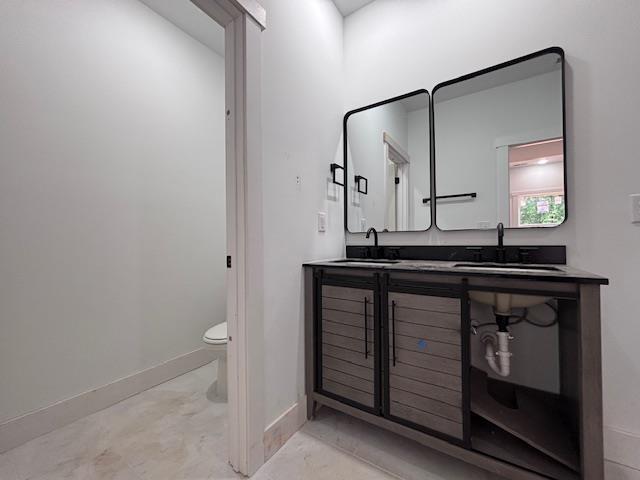 179 Cedar Ave, Wellford, SC 29385 - full bathroom featuring toilet and double vanity