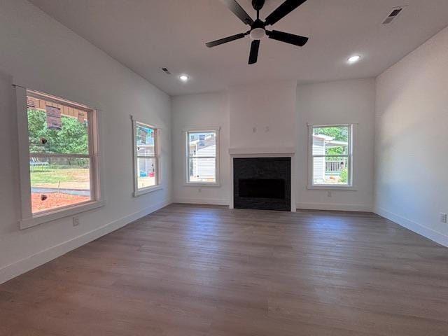 179 Cedar Ave, Wellford, SC 29385 - unfurnished living room featuring plenty of natural light, wood finished floors, ceiling fan, and recessed lighting