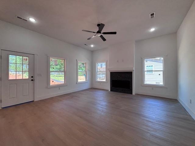 179 Cedar Ave, Wellford, SC 29385 - unfurnished living room featuring plenty of natural light, a ceiling fan, wood finished floors, and recessed lighting