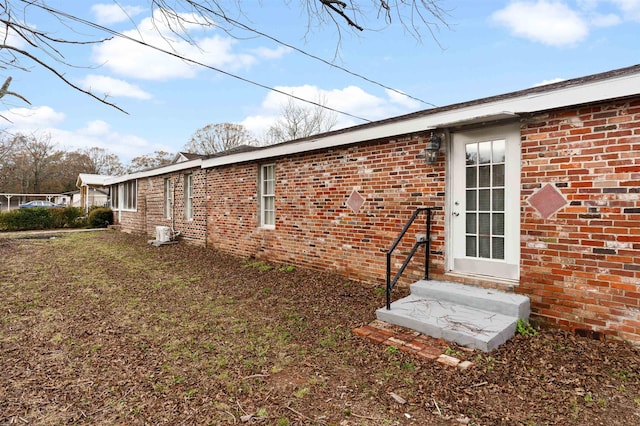 21 U St, Honea Path, SC 29654 - view of home's exterior featuring entry steps and brick siding