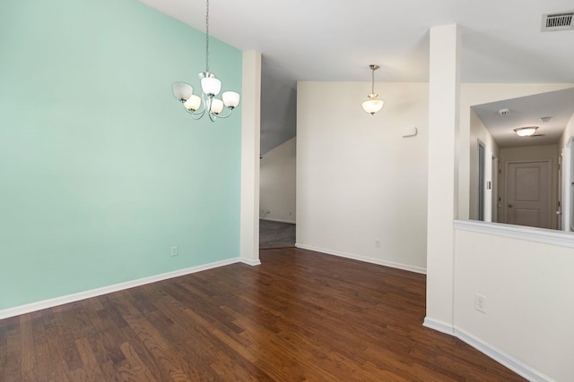 536 Goldstone Ln, Boiling Springs, SC 29336 - empty room with a chandelier, lofted ceiling, and wood finished floors