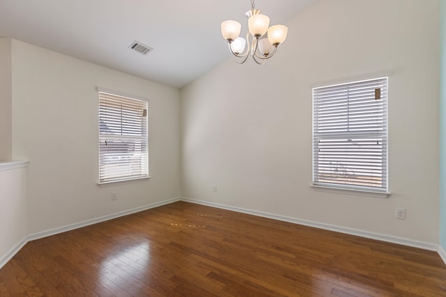 536 Goldstone Ln, Boiling Springs, SC 29336 - empty room with hardwood / wood-style flooring, a chandelier, and vaulted ceiling