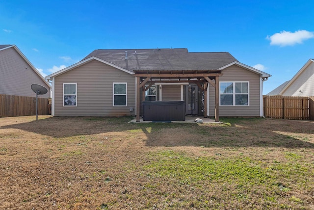 536 Goldstone Ln, Boiling Springs, SC 29336 - rear view of property featuring a hot tub, a fenced backyard, and a patio area