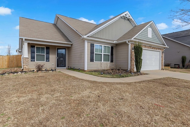 536 Goldstone Ln, Boiling Springs, SC 29336 - view of front facade featuring driveway, an attached garage, board and batten siding, and a shingled roof