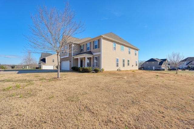 145 Rushing Waters Dr, Inman, SC 29349 - rear view of property featuring a yard and a garage
