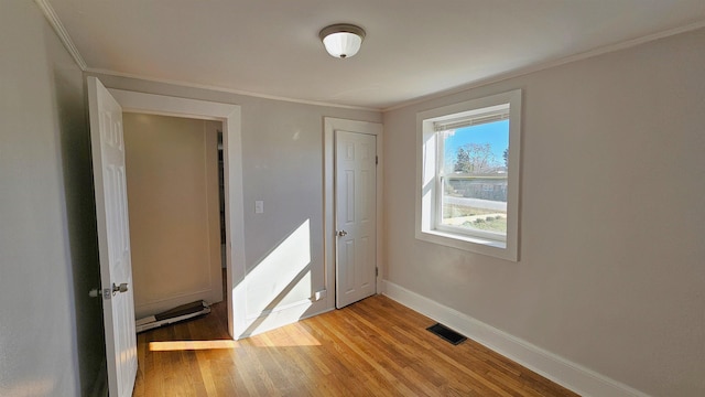 150 Cromer St, Roebuck, SC 29376 - unfurnished bedroom featuring crown molding and light wood-type flooring