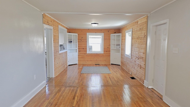 150 Cromer St, Roebuck, SC 29376 - entryway with wood walls, crown molding, and light wood-style floors