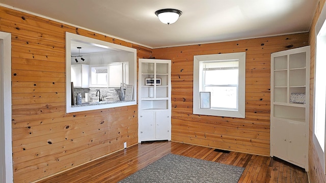 150 Cromer St, Roebuck, SC 29376 - entryway featuring wood walls, hardwood / wood-style flooring, and ornamental molding