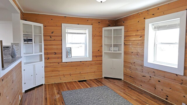 150 Cromer St, Roebuck, SC 29376 - entryway featuring wood finished floors, wooden walls, and ornamental molding