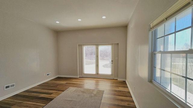 150 Cromer St, Roebuck, SC 29376 - unfurnished room featuring plenty of natural light, dark wood finished floors, and recessed lighting