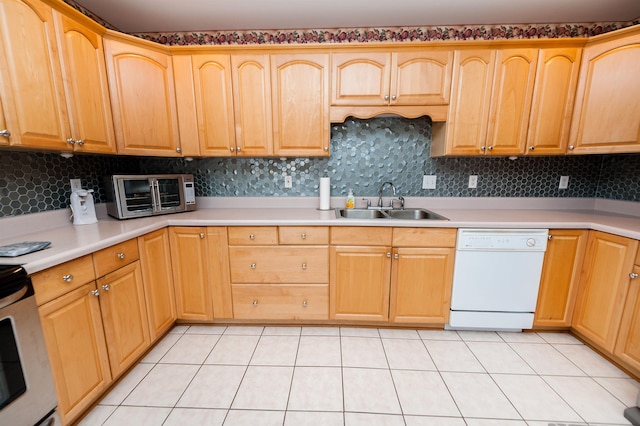 1 Carnoustie Ct, Campobello, SC 29322 - kitchen with dishwasher, tasteful backsplash, light countertops, and light tile patterned floors