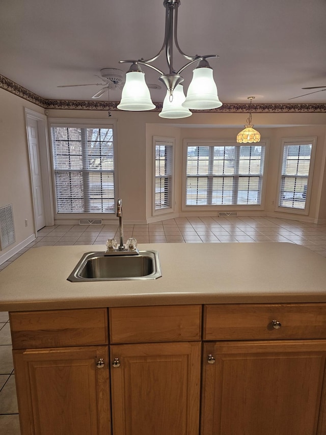 1 Carnoustie Ct, Campobello, SC 29322 - kitchen with ceiling fan, healthy amount of natural light, decorative light fixtures, and light tile patterned flooring