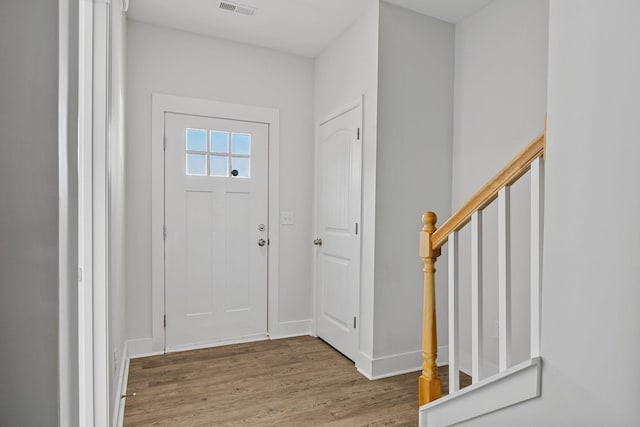 235 Marshland Ln, Greer, SC 29650 - foyer entrance with wood finished floors and stairs