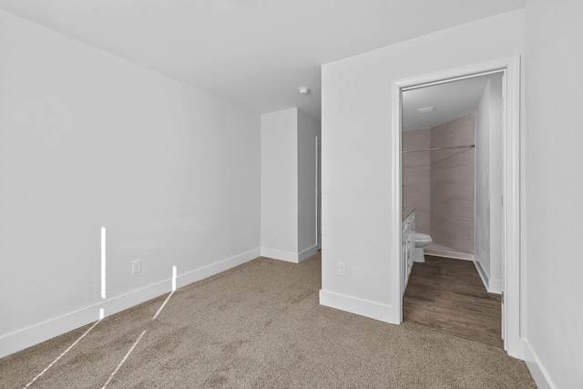 235 Marshland Ln, Greer, SC 29650 - unfurnished bedroom featuring carpet floors and baseboards