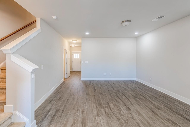105 Lerner Ct, Spartanburg, SC 29301 - unfurnished room featuring wood finished floors, stairway, recessed lighting, and a smoke detector