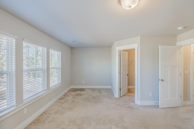 105 Lerner Ct, Spartanburg, SC 29301 - unfurnished bedroom with light carpet, a spacious closet, and a closet