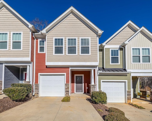105 Lerner Ct, Spartanburg, SC 29301 - multi unit property with a garage, concrete driveway, stone siding, and board and batten siding