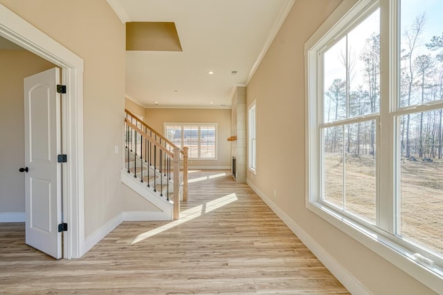 155 Chestnut Dr, Woodruff, SC 29388 - corridor featuring crown molding, light wood-style floors, stairway, and recessed lighting