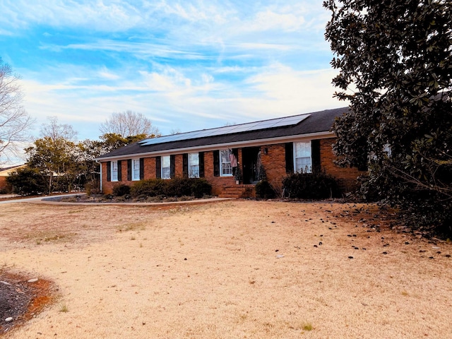 107 Mulberry St, Inman, SC 29349 - ranch-style house featuring brick siding and solar panels