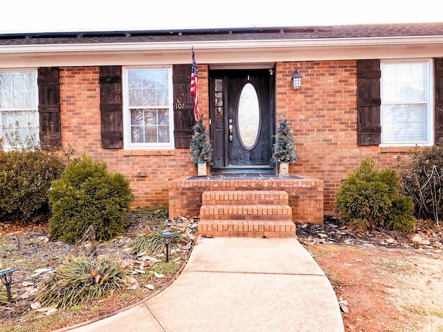 107 Mulberry St, Inman, SC 29349 - property entrance with brick siding and solar panels