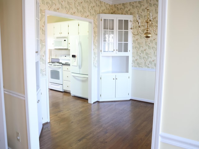 101 Sheraton Loop, Gaffney, SC 29341 - kitchen with white appliances, wallpapered walls, dark wood-type flooring, white cabinetry, and crown molding