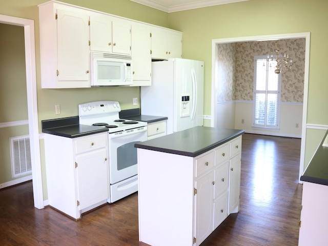 101 Sheraton Loop, Gaffney, SC 29341 - kitchen featuring white appliances, dark countertops, white cabinetry, ornamental molding, and wainscoting