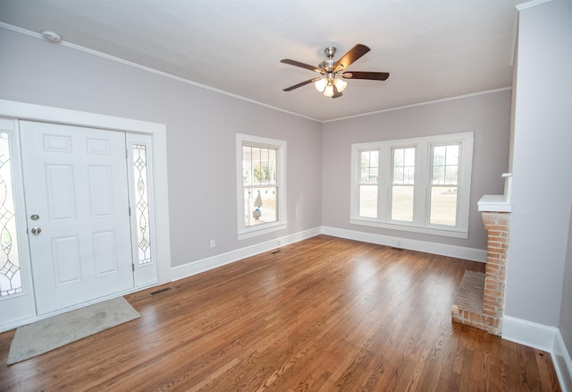 708 E Main St, Union, SC 29379 - entryway with ceiling fan, wood finished floors, and crown molding