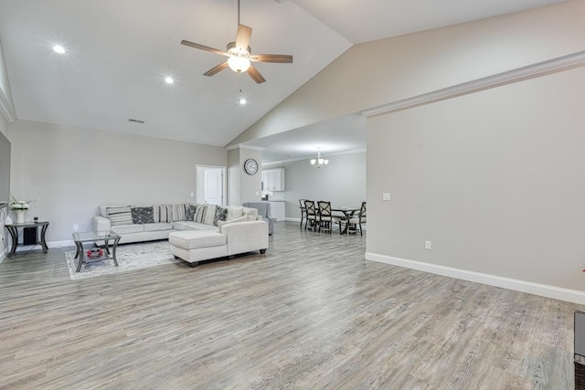 139 Floyd Meadow Dr, Inman, SC 29349 - living area with high vaulted ceiling, wood finished floors, ceiling fan, recessed lighting, and a chandelier