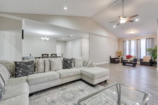 139 Floyd Meadow Dr, Inman, SC 29349 - living room with vaulted ceiling, wood finished floors, a chandelier, ceiling fan, and recessed lighting