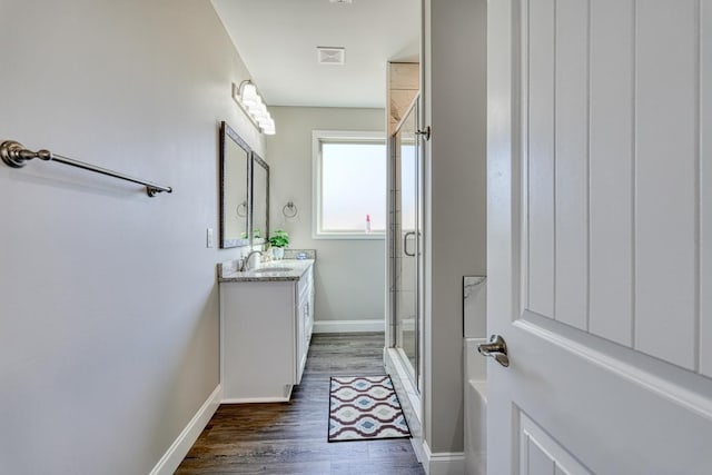 139 Floyd Meadow Dr, Inman, SC 29349 - bathroom featuring vanity, a stall shower, wood finished floors, and a bath
