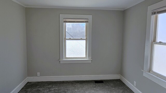 210 James St, Union, SC 29379 - empty room with dark colored carpet and ornamental molding
