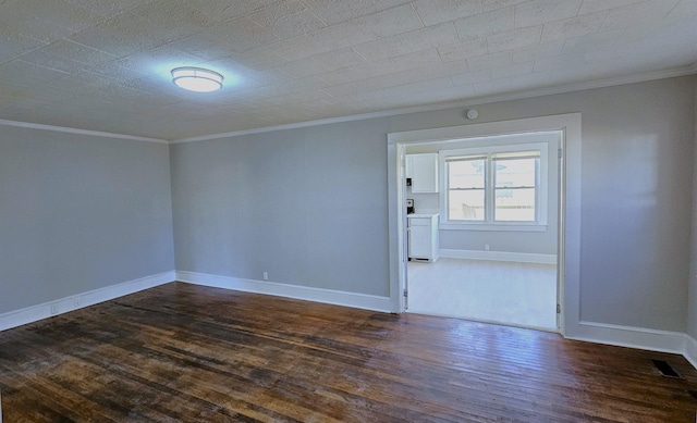 210 James St, Union, SC 29379 - empty room with dark wood-style flooring and ornamental molding