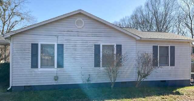 302 Morgan St, Greer, SC 29651 - view of home's exterior with crawl space and a shingled roof