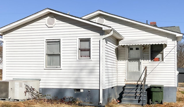 302 Morgan St, Greer, SC 29651 - view of front of house featuring crawl space, a chimney, and entry steps