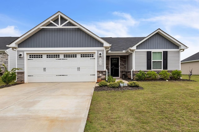 2068 Wexley Dr, Boiling Springs, SC 29316 - view of front of property featuring stone siding, board and batten siding, a front yard, a garage, and concrete driveway