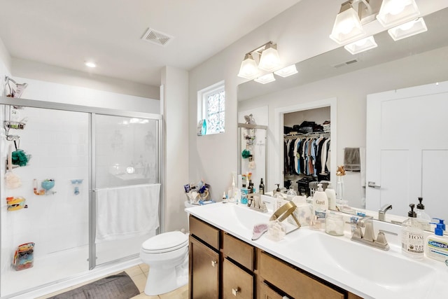 2068 Wexley Dr, Boiling Springs, SC 29316 - full bath featuring a shower stall, double vanity, a spacious closet, and tile patterned floors