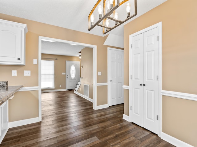 160 Blake Garrison Dr, Roebuck, SC 29376 - entryway featuring stairway and dark wood-style flooring