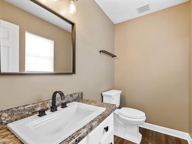 160 Blake Garrison Dr, Roebuck, SC 29376 - bathroom featuring wood finished floors and vanity
